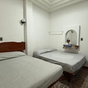 Habitación con 2 Camas Individuales